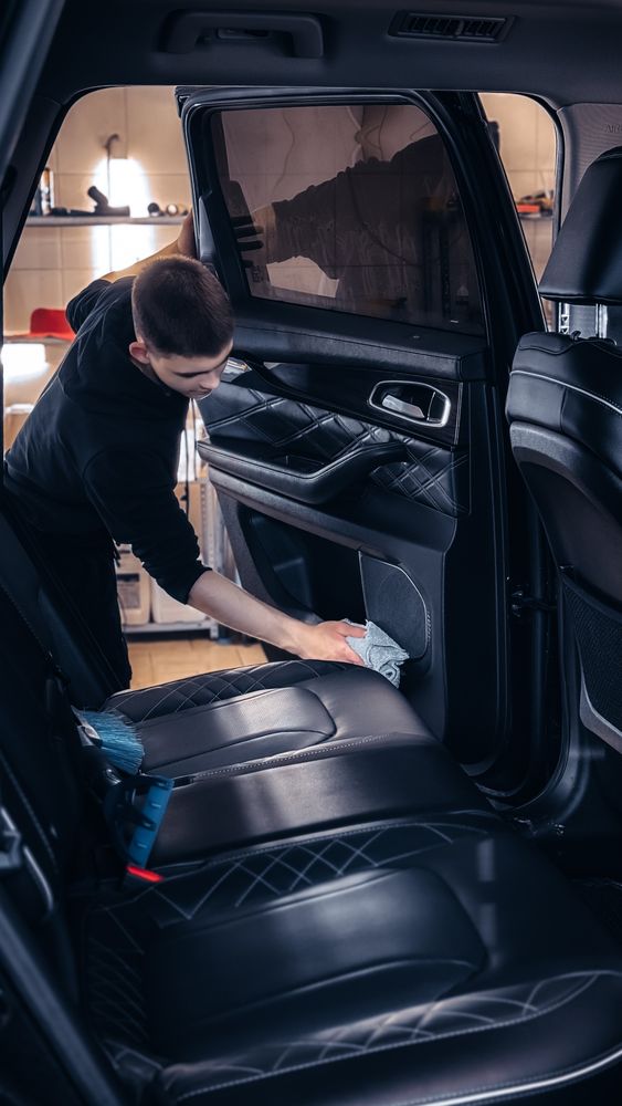 Car interior being professionally cleaned and detailed