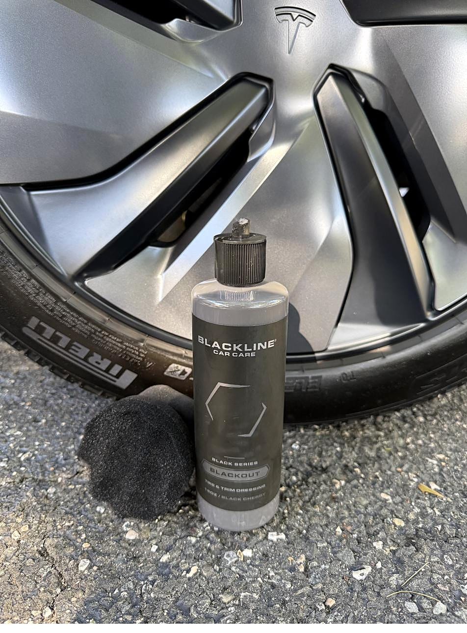 Blackline Blackout tire and trim dressing with a foam tire shine applicator
